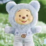 Winnie en peluche dans une boîte mystère