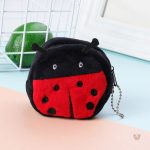 Petit sac en peluche en forme de coccinelle colorée