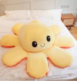 Peluche géante réversible, parfaite pour les câlins