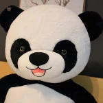 Peluche panda géant avec une fleur colorée