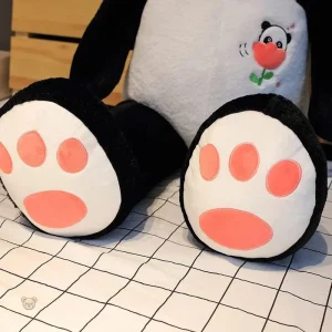 Panda en peluche doux, géant et orné d'une fleur