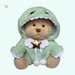 Ours en peluche déguisé en dinosaure