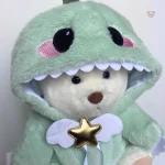 Peluche ours avec costume amusant de dinosaure
