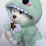 Ours en peluche doux avec look de dinosaure