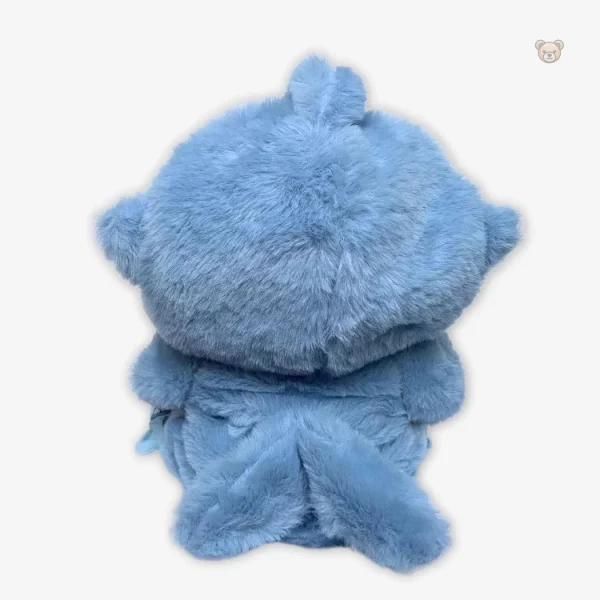 Doux ours en peluche avec look de requin