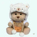 Ours en peluche avec salopette marron