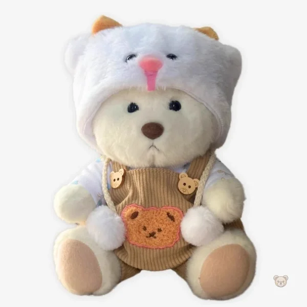 Doudou ourson en salopette marron doux