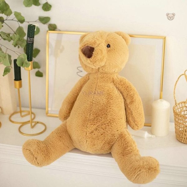 ours-en-peluche-petit-brun-assis-1 Ours en peluche brun assis, doux et câlin