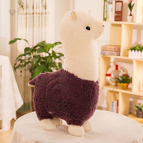 Alpaga en peluche câlin avec robe colorée