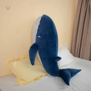 Baleine bleue en peluche, design joyeux avec bouche ouverte