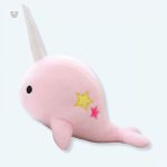 Peluche baleine rose douce pour enfant dans un univers féerique
