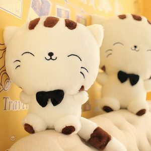 Peluche chat jaune, compagnon idéal pour les moments de tendresse