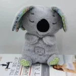 Peluche koala gris avec bruit blanc apaisant