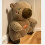 Peluche capybara avec sons relaxants pour le sommeil