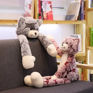 Peluche marron en forme de chat, idéale pour les câlins