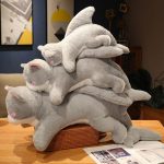 Doux jouet en peluche pour les amateurs de chats et de requins