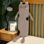 Peluche douce en forme de chat pour un sommeil apaisant