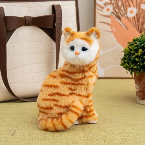 Peluche chat réaliste, accessoire de confort à la maison