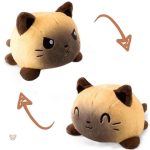 Peluche réversible aux motifs variés