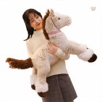 Peluches en forme de cheval beige pour les petits