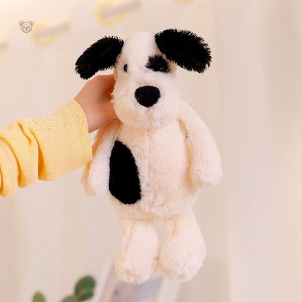 Chien en peluche blanc, design original avec œil noir