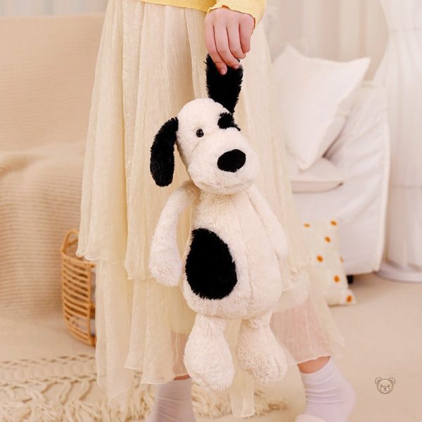 Peluche canine blanche, idéale pour les câlins et le jeu