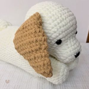 Chien en peluche doux, compagnon idéal pour les nuits paisibles