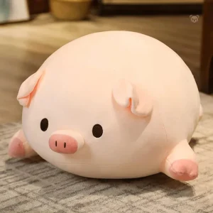 Peluche cochon allongé avec yeux ouverts