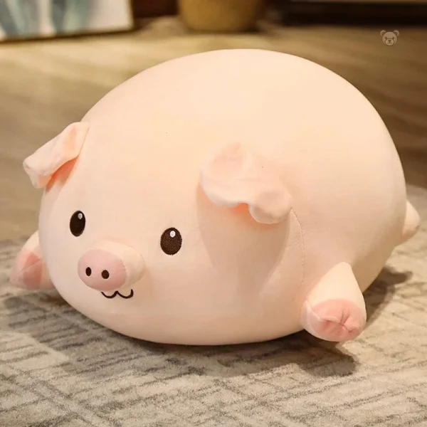 peluche-cochon-allonge-content-1 Peluche cochon allongé