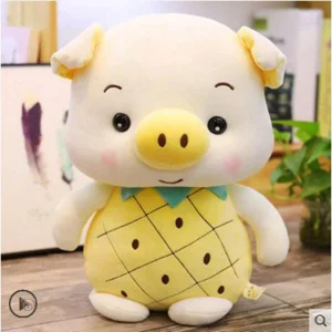 Peluche cochon en costume d'ananas