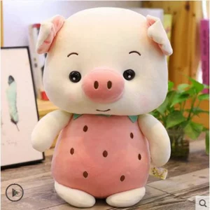 Peluche cochon en costume de fraise