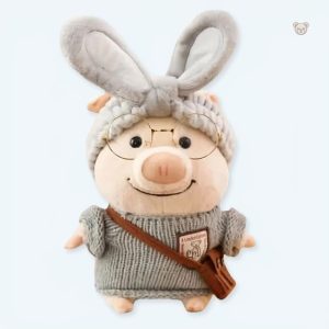 Peluche cochon douce en pull gris pour un hiver chaleureux