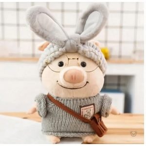 Peluche cochon chaleureuse, idéale pour les jours froids d'hiver