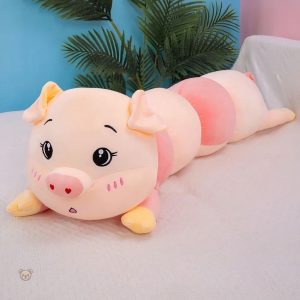 Détente avec cette peluche cochon douce, idéale pour le sommeil