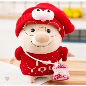 Cochon en peluche rose au pull doux, parfait pour un cadeau romantique