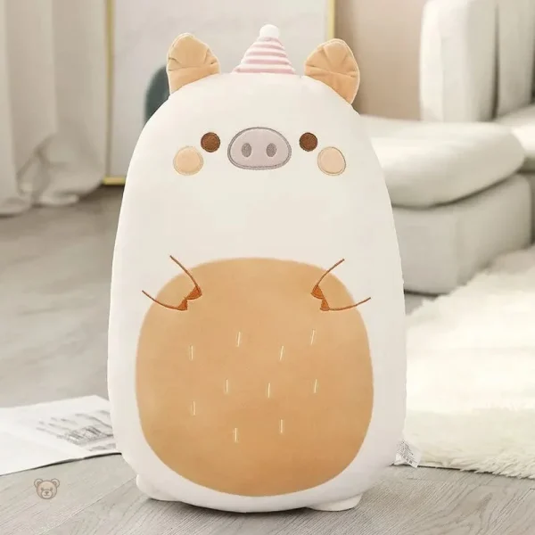 peluche-cochon-squishmallow-fetard-1 Peluche cochon squishmallow festive et douce
