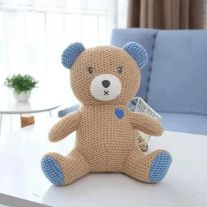 Peluche crochet ourson avec oreilles bleues