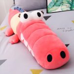 Peluche crocodile tendre, parfait pour les moments de réconfort