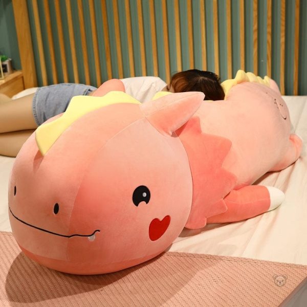 Dinosaur en peluche avec motif cœur