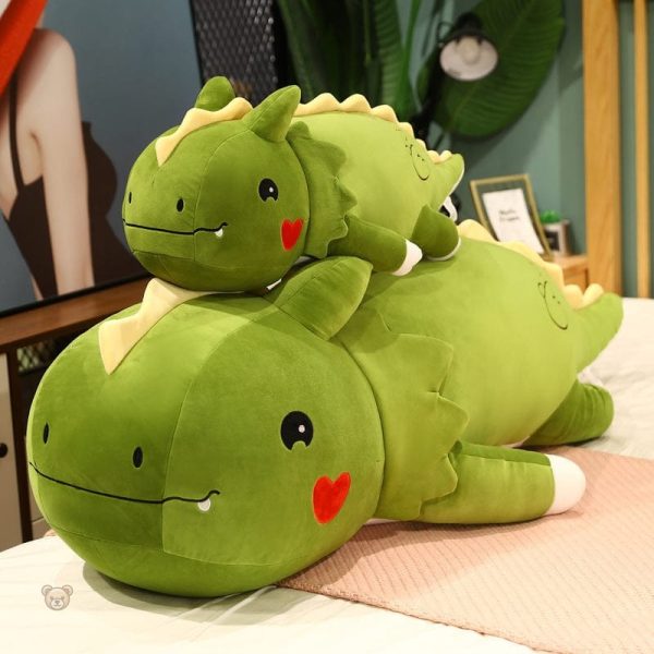 Peluche dino mignonne avec cœur sur la joue
