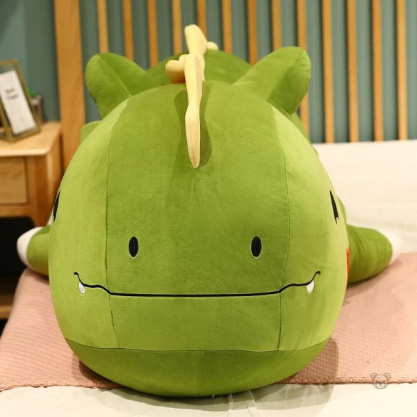 Peluche de dinosaure colorée avec cœur