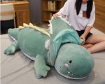 Dinosaure en peluche bleu, idéal pour les petits câlins