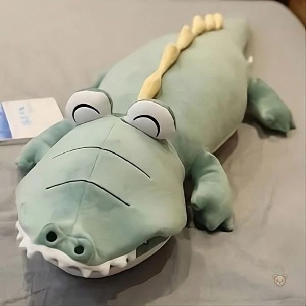 Câlin tout en douceur avec ce dinosaure en peluche bleu