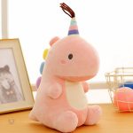Doudou dinosaure câlin aux couleurs arc-en-ciel