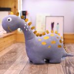 Doudou dinosaure amusant en couleur violette