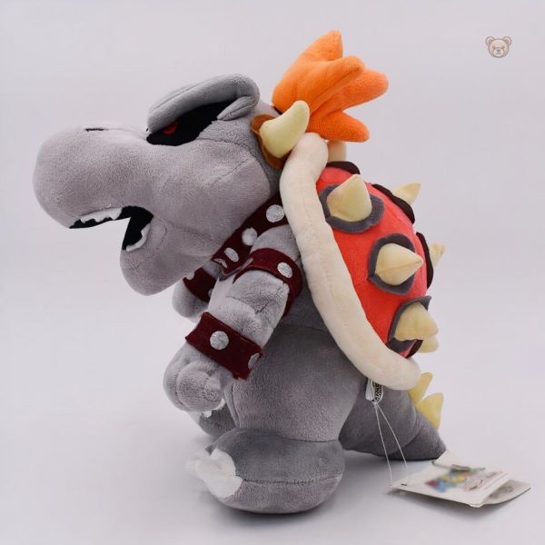 Peluche colorée de Bowser, dragon emblématique du jeu vidéo