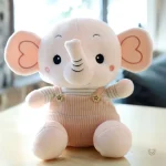 Peluche éléphant joyeux, parfait pour les câlins