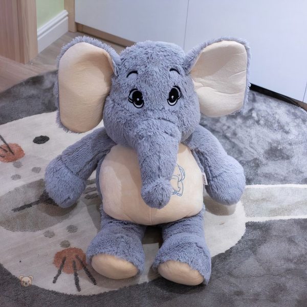 peluche-elephant-gris-geant-doux-calin-chambre-enfant-1 Peluche éléphant gris géant doux pour câlins en chambre d'enfant