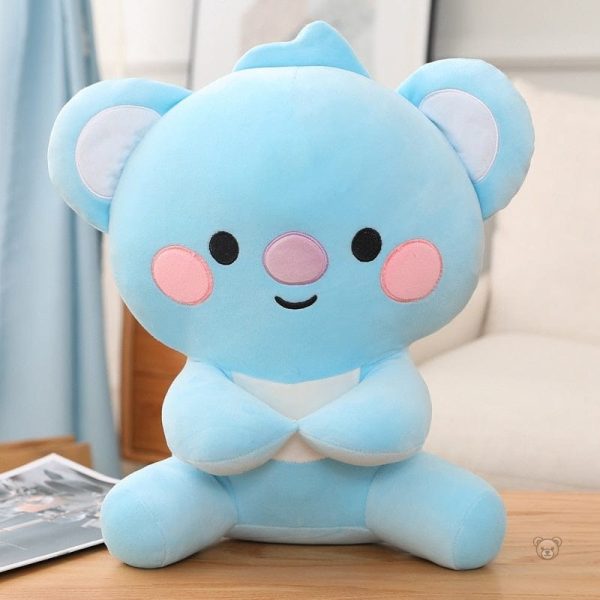 Peluche squishmallow émoji à câliner