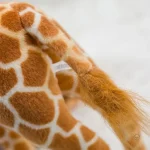 Peluche girafe tendre, parfaite pour les jeux imaginatifs